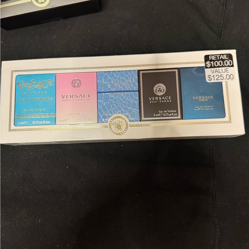 Versace Fragrance Collection with Turquoise, Pink, Blue, and Black